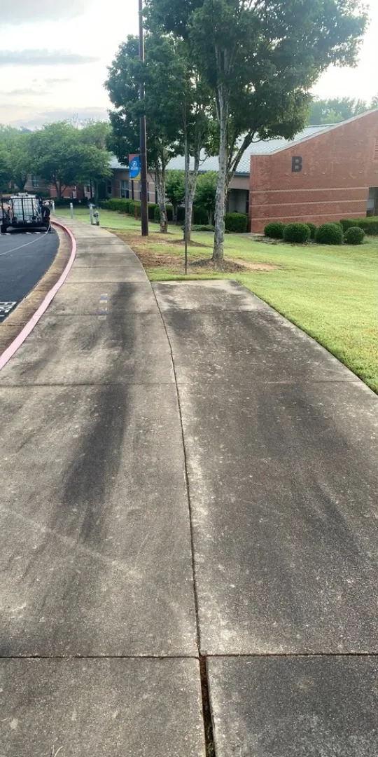 Commercial sidewalk, before washing