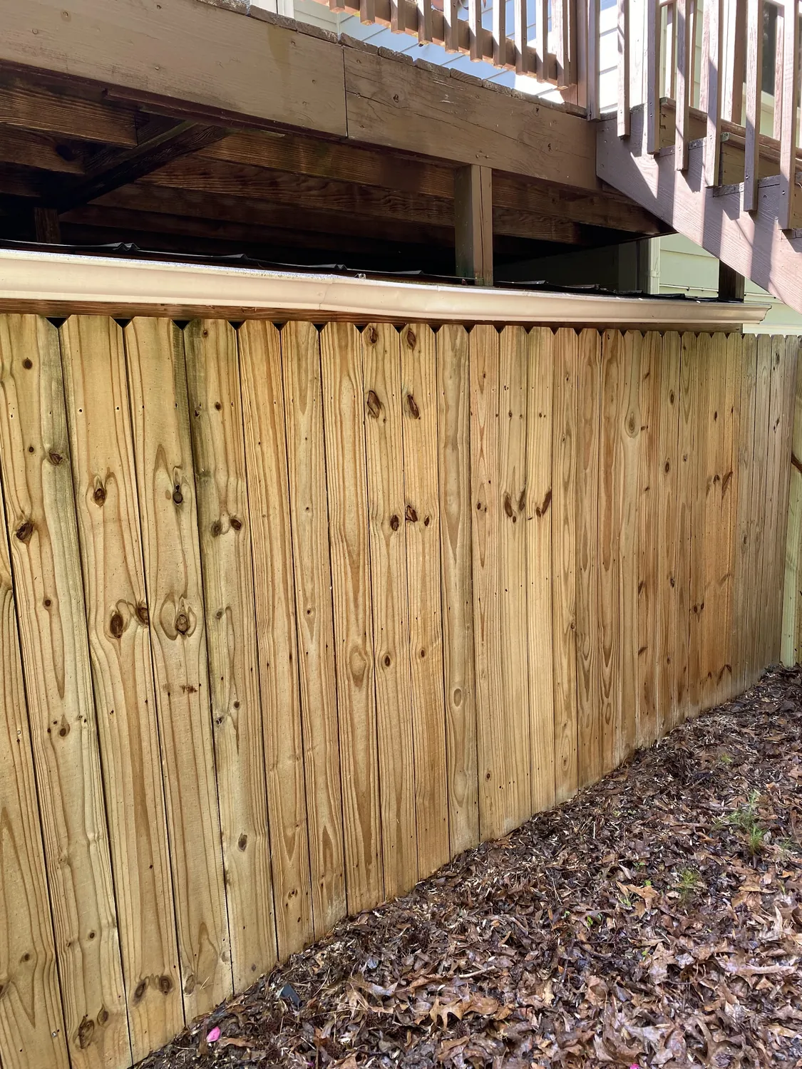 A clean wood privacy fence