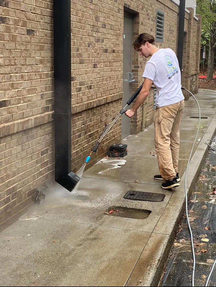 Flushing a downspout drain